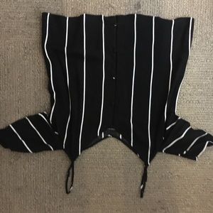 Off the should black and white tank